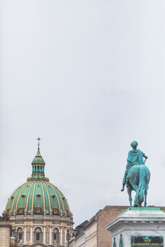 Denmark, Copenhagen, Equestrian statue of Frederick V with Frederiks Church in background