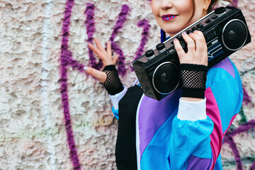 1980s retro-styled woman with ghetto blaster