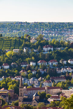 Church and residential buildings amidst trees at Hasenbergsteige, Stuttgart, Baden-W&Ocirc;&oslash;&Omega;rttemberg, Germany