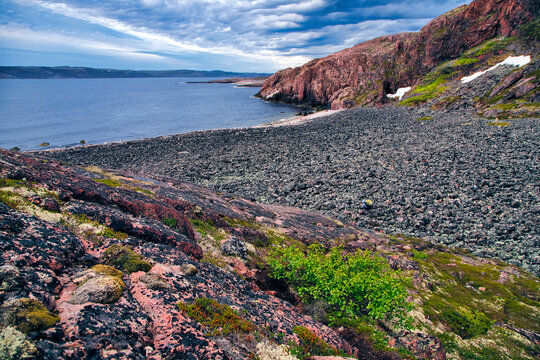 Cliffs and rocky beach of Barents Sea