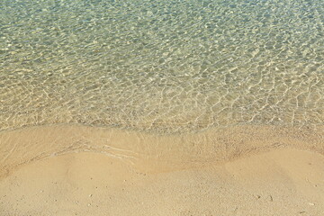 Sandy beach with clear sea. Adriatic sea in Croatia.
