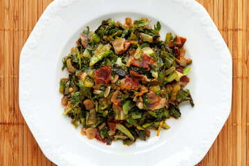 Top view of cabbage greens and ham stir fry.