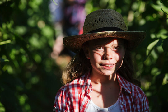 Smiling girl in garden