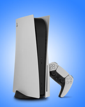 Sony PlayStation 5 Console and controller on blue background