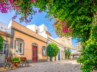 Charming streets with traditional houses in Faro, Algarve, Portugal