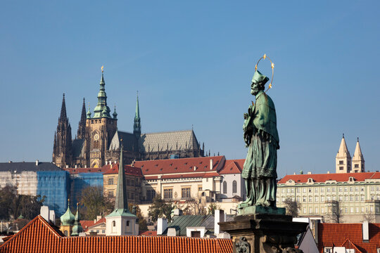 Czech Republic, Prague, St. Vitus Cathedral and St. John Nepomuk statue