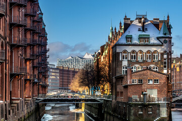 The marvelous Speicherstadt in Hamburg with snow on the roofs on a winter day