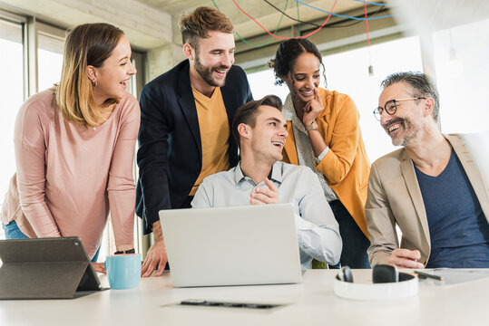 Happy business people having a meeting in office