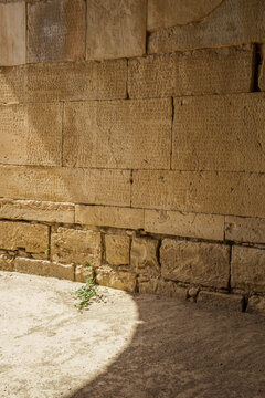 Scripts carved on stone wall at Odeon Of Gortyn, Crete, Greece