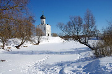 Fototapeta na wymiar Russia, Bogolyubovo - March, 2021: Church of the Intercession on the Nerl. Orthodox church and a symbol of medieval Russia, Vladimir region