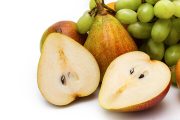 Pears and grapes on a white background. Copy space.