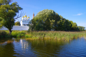 Fototapeta na wymiar Village Teryaevo, Volokolamsk district, Moscow region, Russia - September, 2020: Iosifo-Volotsky monastery, view from the lake