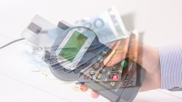 Animation of euro banknotes falling over hand of caucasian man holding payment terminal