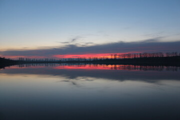 Masterpiece in the sky. Sunset on the horizon. No filter