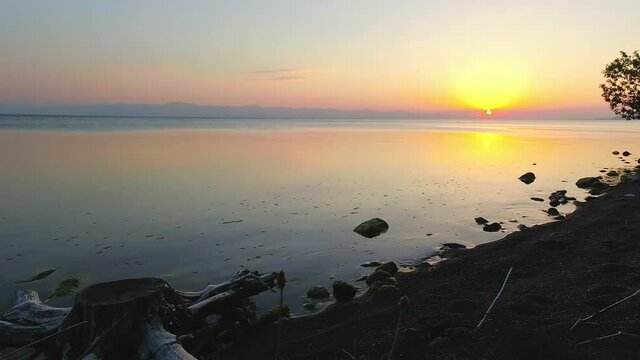 Scenic sunset over Sevan lake popular holiday destination in Armenia
