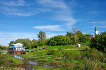 Fototapeta premium Ryazan, Russia - September, 2020: View on the river Trubezh and pier in the town Ryazan