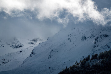 fresh snow in the alps at a autumn morning in october