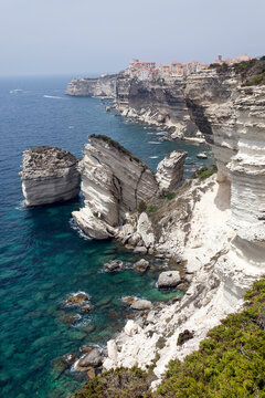 White Limestone Cliffs against clear sky at Bonifacio, Corsica, France