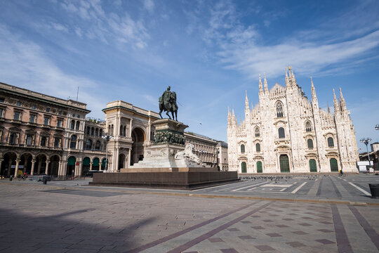 Italy, Milan, Monument to Victor Emmanuel II standing at empty Piazza del Duomo during COVID-19 outbreak