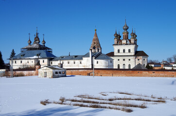 Fototapeta na wymiar Yuryev-Polsky, Vladimir Oblast, Russia - March, 2021: Mikhailo - Arkhangelskiy Monastery in winter sunny day