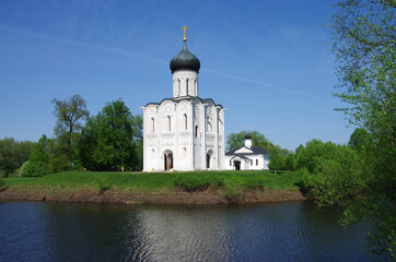 Russia, Bogolyubovo - May, 2021: Church of the Intercession on the Nerl. Orthodox church and a symbol of medieval Russia, Vladimir region