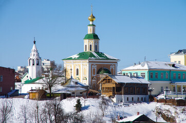 Vladimir, Russia - March, 2021: Top view of the city street in winter sunny day. Saint George Cathedral