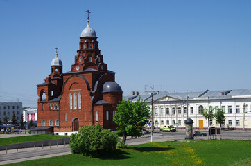 Fototapeta na wymiar Vladimir, Russia - May, 2021: Ancient city street in spring sunny day. Trinity Church