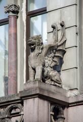 Obraz premium Vyborg, Russia - July, 2021: Balcony with griffins on the Nordic Bank - a financial and credit institution that operated from 1873 to 1919