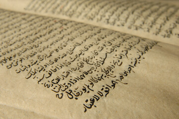 Ancient open book in arabic. Old arabic manuscripts and texts