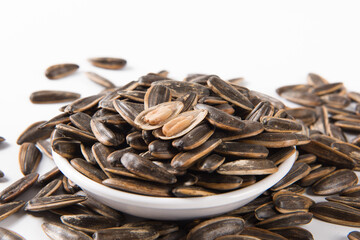 roasted peeled sunflower seeds in small plate 