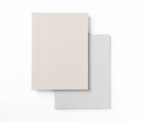 Grey hardcover books, isolated on white background. Top view