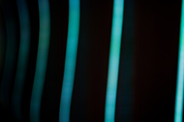 Light stripes in cold colors. Blue and green colors with linear waves. Abstract background from...