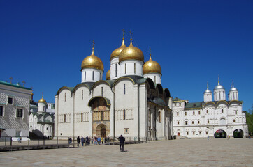 Moscow, Russia - May, 2021: Moscow kremlin inside in sunny spring day. Sobornaya Square and the Assumption Cathedral