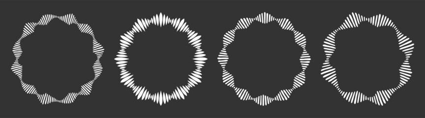 Set of four abstract circular ornaments, ethnic ornament patterns, striped frames. Decorative patterns isolated on black background. Design elements. Vector monochrome illustration.