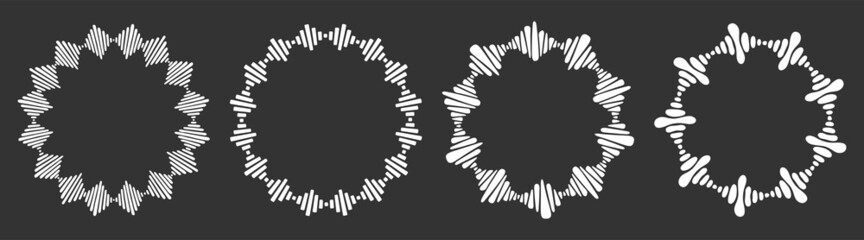 Set of four abstract circular ornaments, hand drawn ethnic ornament patterns, striped frames. Decorative patterns, isolated on black background. Design elements. Vector monochrome illustration.