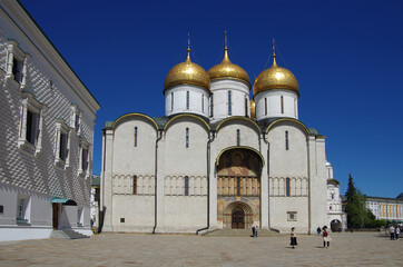 Moscow, Russia - May, 2021: Moscow kremlin inside in sunny spring day. Sobornaya Square and the Assumption Cathedral