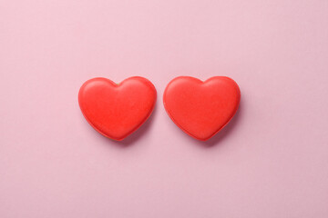 Two heart shaped cakes on pastel pink background, love, marriage concept, Valentines day card
