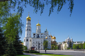 Fototapeta na wymiar Moscow, Russia - May, 2021: Moscow kremlin inside in sunny spring day. Ivan the Great belltower