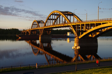 Rybinsk, Russia - May, 2021: Evening view of the Rybinsk bridge