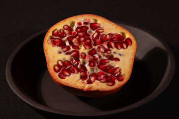 a fresh delicious red pomegranate