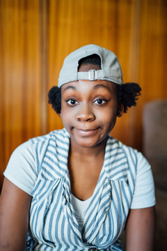 Portrait of a teenage girl wearing a baseball cap