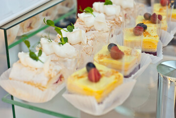 Sweets on the table. Colorful cookies and pastries at the fair. Demonstration of local confectionery.