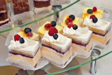 Sweets on the table. Colorful cookies and pastries at the fair. Demonstration of local confectionery.