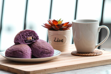 A homemade Ube bread with yam and cheese filling.
