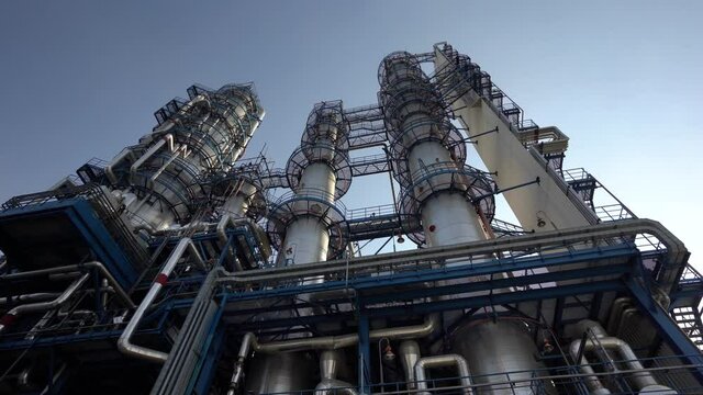 Oil refinery. Reactors. Bottom-up view. Oil refining plant
