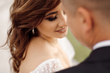 Portrait of wedding day. romantic gentle touch, concept of love and happy marriage. touching attitude of young couple. portrait of bride and groom. Life style, photo.