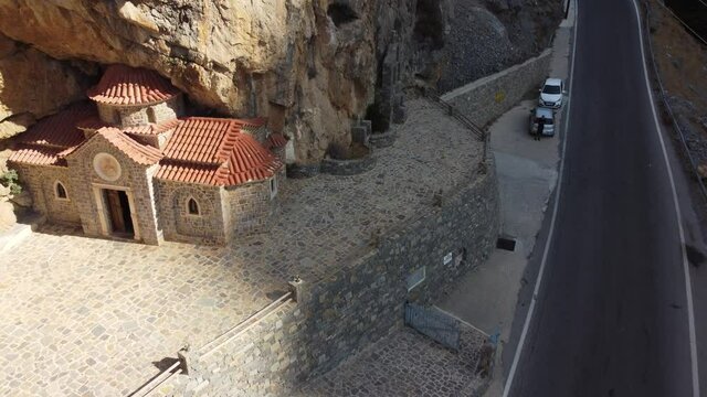 Picturesque belfry of the old orthodox church of Saint Nicholas the Wonderworker, built in the rock.Crete island. Greece.Europe.