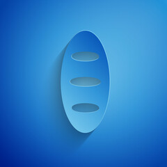 Paper cut Bread loaf icon isolated on blue background. Paper art style. Vector