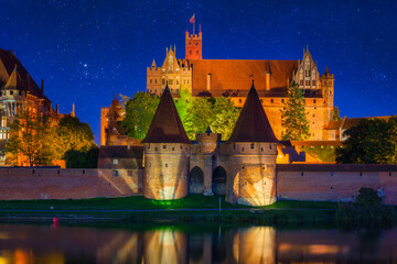 Fototapeta na wymiar Malbork Castle of the Teutonic Order at night, Poland