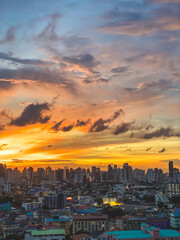 Vertical shot of the cityscape of Bangkok in Thailand at sunset